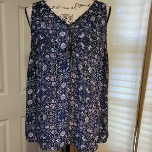 Sleeveless zip front blouse